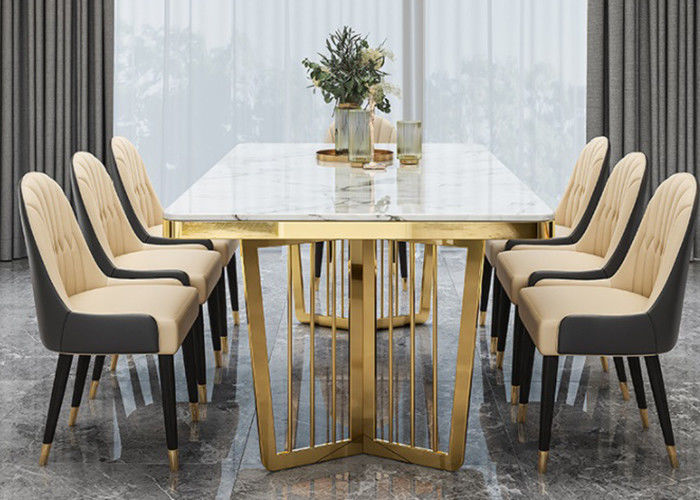 Mesa de comedor de mármol de lujo elegante, tabla superior de mármol con las piernas del metal