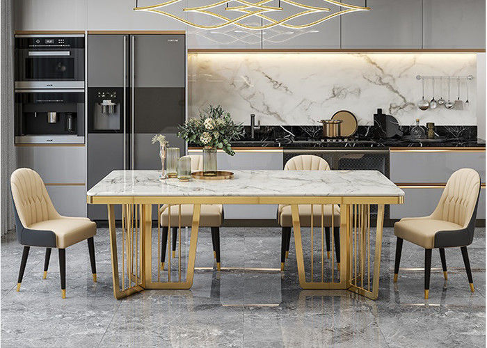 Mesa de comedor de mármol de lujo elegante, tabla superior de mármol con las piernas del metal