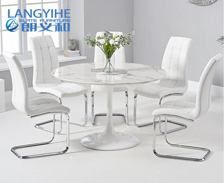 mesa de comedor redonda de mármol blanca del 120cm y tapizado cenando la silla