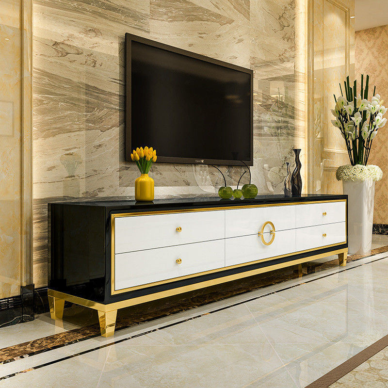 El soporte de acero inoxidable y la mesa de centro de la TV fijaron los muebles de lujo de la sala de estar
