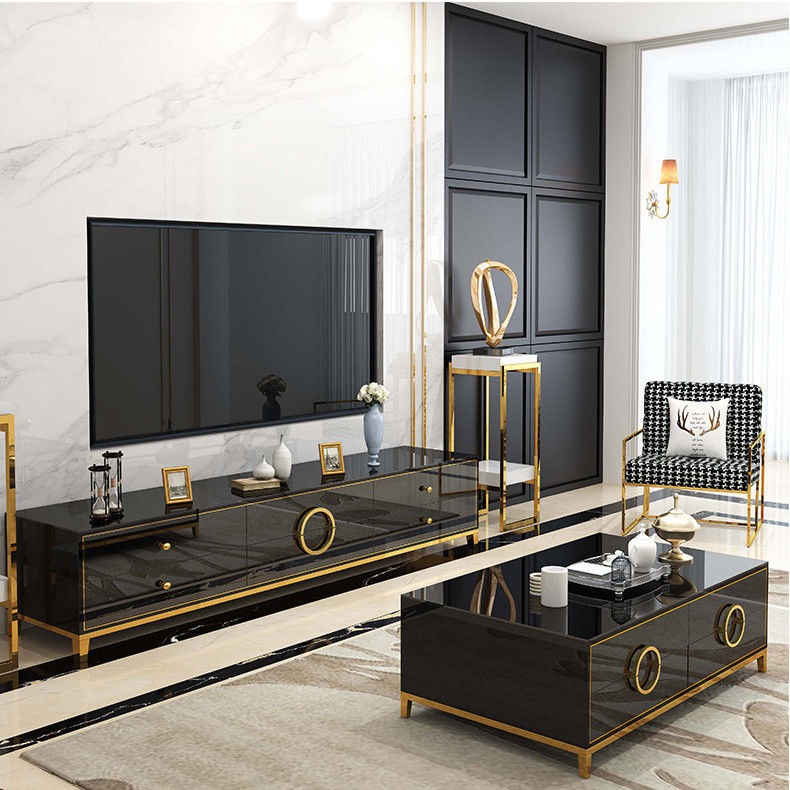 El soporte de acero inoxidable y la mesa de centro de la TV fijaron los muebles de lujo de la sala de estar